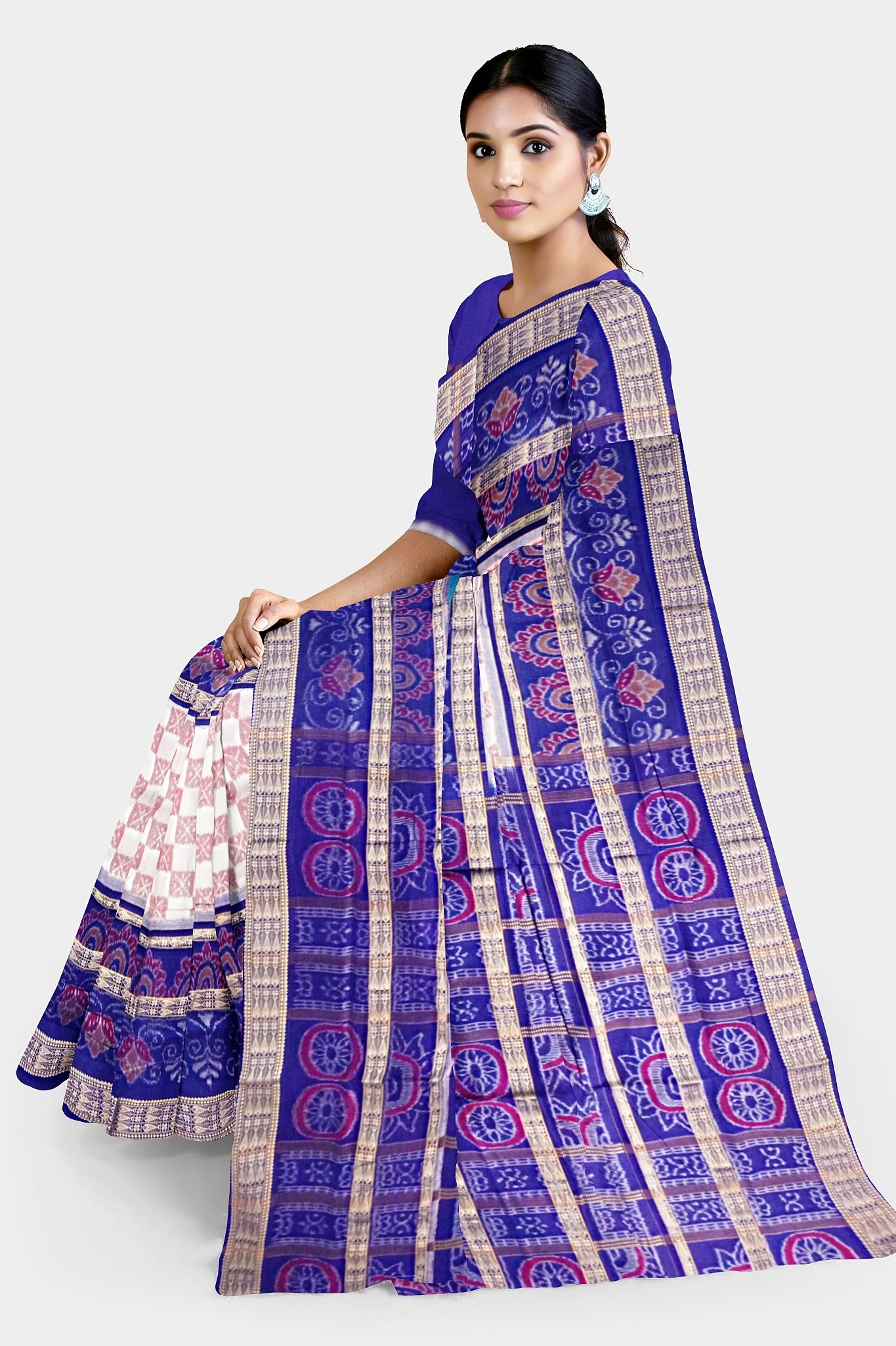 Peach and blue Sambalpuri cotton saree with duck and flower body pattern, complemented by a big flower design on the pallu.