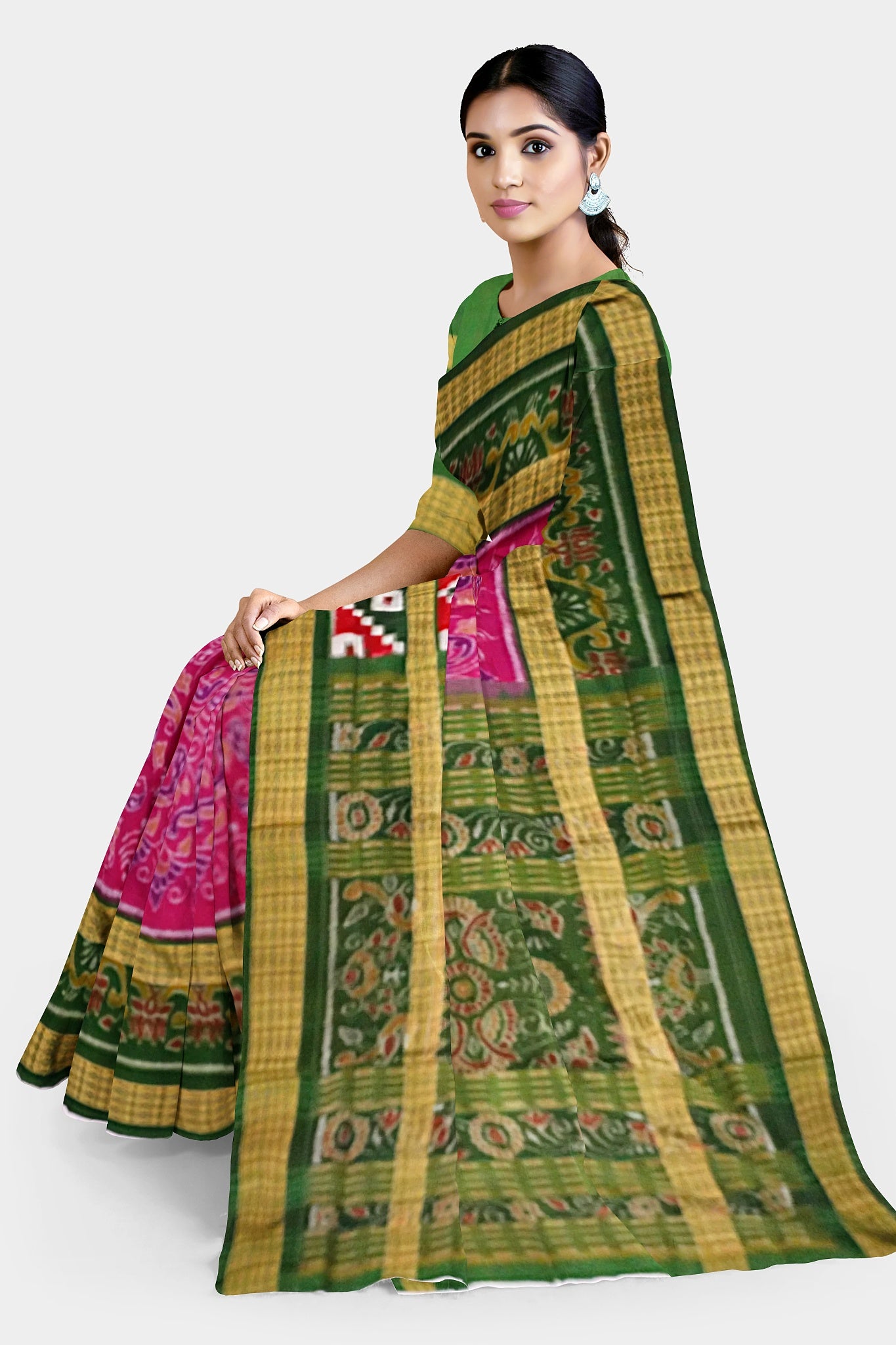 Pink and dark green Sambalpuri cotton saree features a body with kalash, peacock, and little man patterns, while the pallu showcases floral designs.