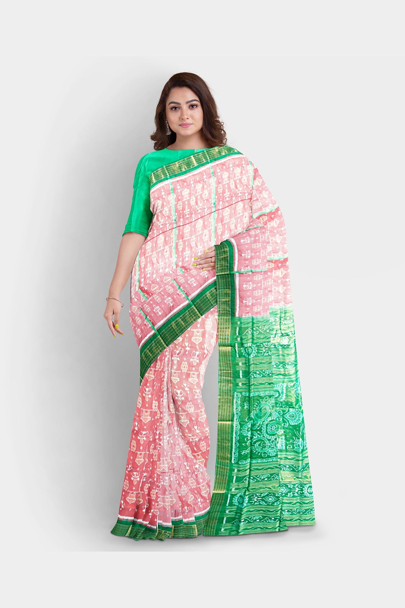 Elegant pink and green pure pata saree with small man motifs on the body and large round floral designs on the pallu.
