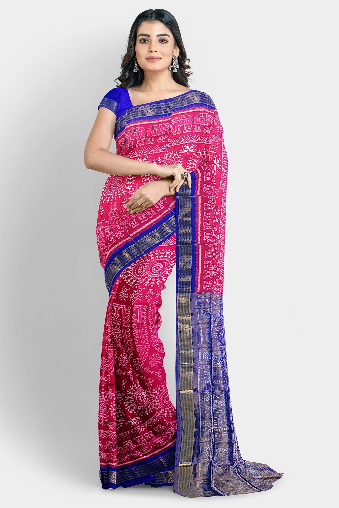 Pink and blue pure Pata saree with round flowers, Adivasi patterns, and a half pallu design.
