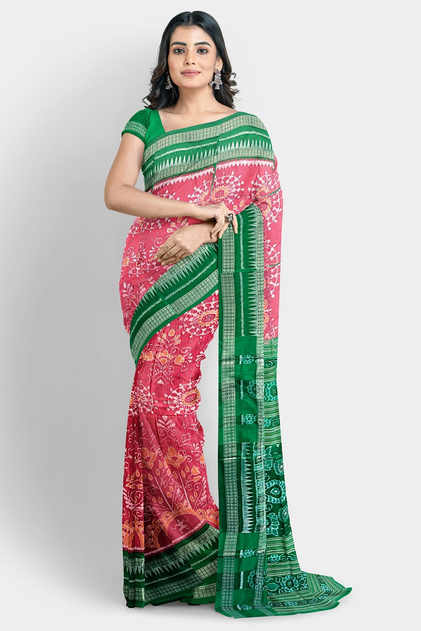 Pink and red pure Pata saree with vibrant floral body and green pallu featuring three big flowers.