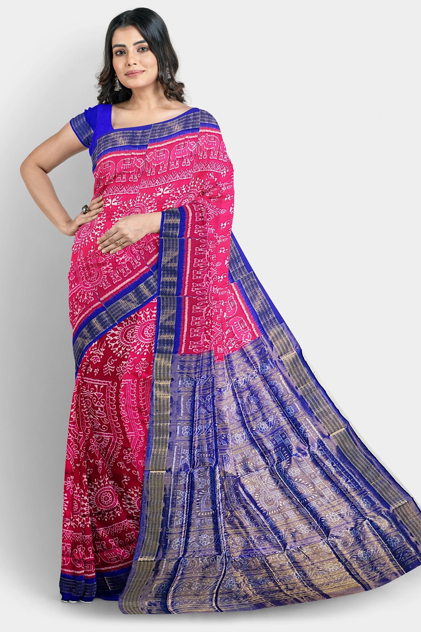 Pink and blue pure Pata saree with round flowers, Adivasi patterns, and a half pallu design.