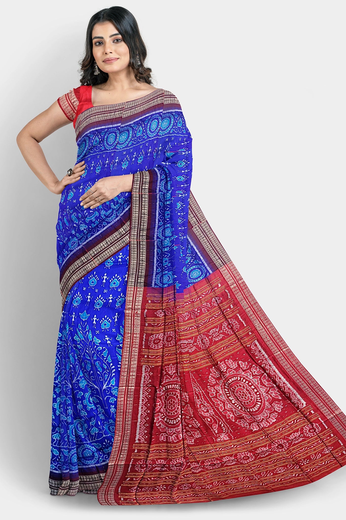 A blue and red pure Pata saree with small tree body pattern, terracotta designs, and pallu featuring three round flowers or vines.