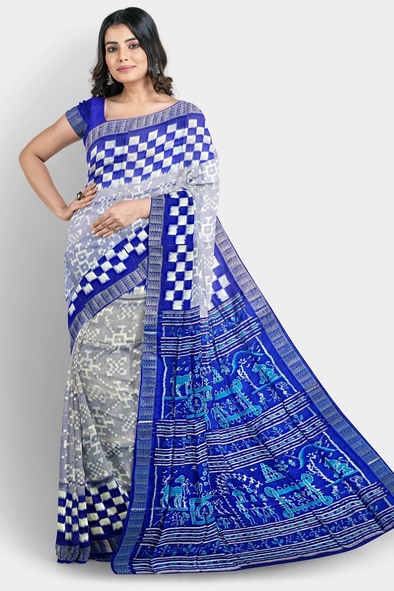 A white and blue pure Pata saree with a plain body, Pasapli border, and pallu featuring blue terracotta, house, beer, tree, cat, and duck designs.