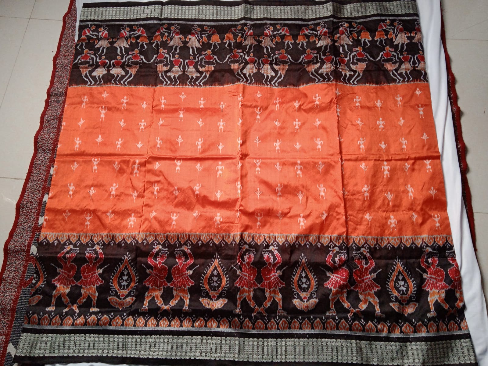 Nartaki with terracotta pattern pure silk saree is Orange & Black color base. - Koshali Arts & Crafts Enterprise