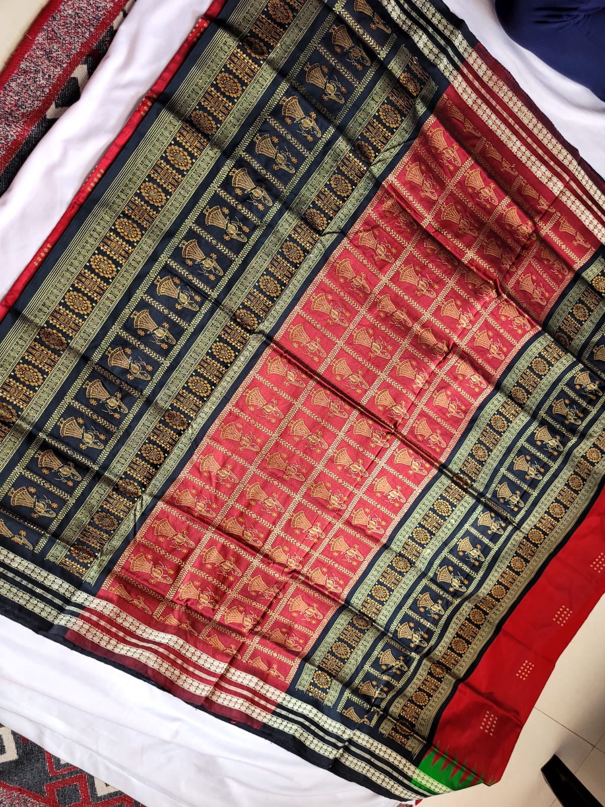 Traditional doll pattern design Sambalpuri pata saree in Maroon, Black & Green color . - Koshali Arts & Crafts Enterprise