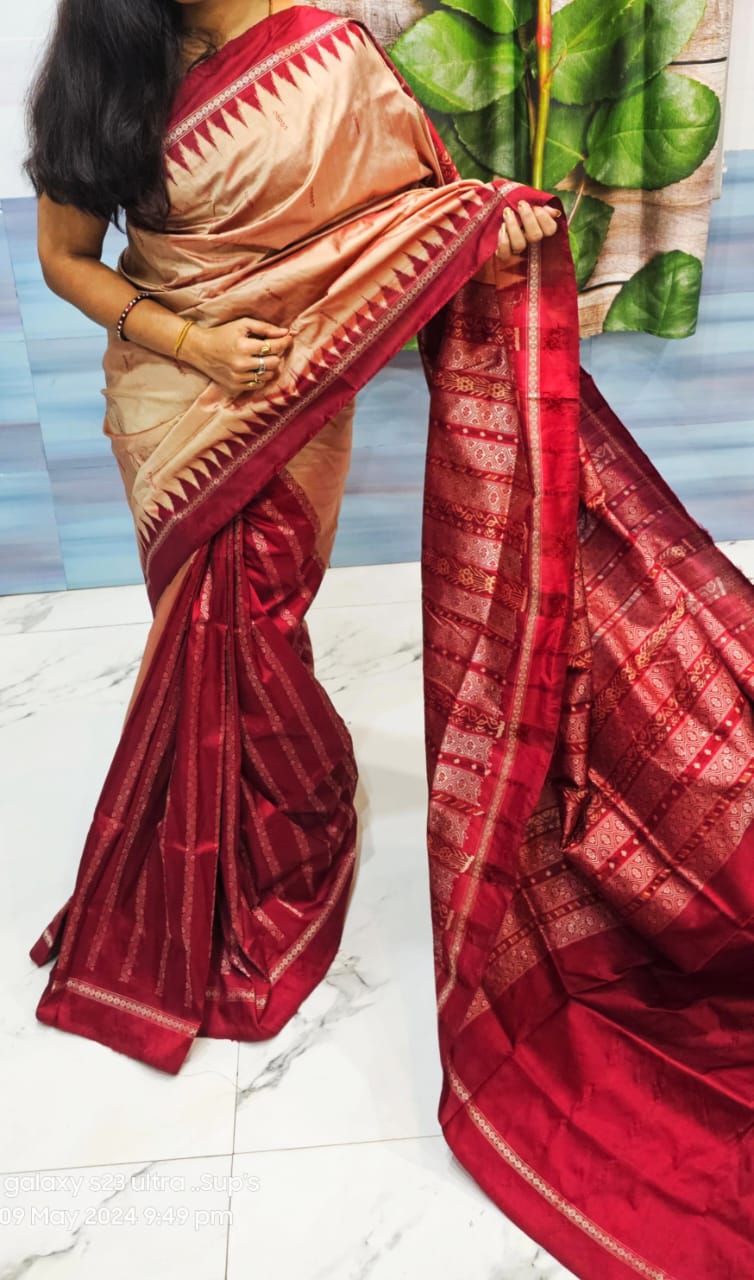 Peach and maroon plain body patli design pata saree, complete with matching blouse piece, epitomizes understated elegance.