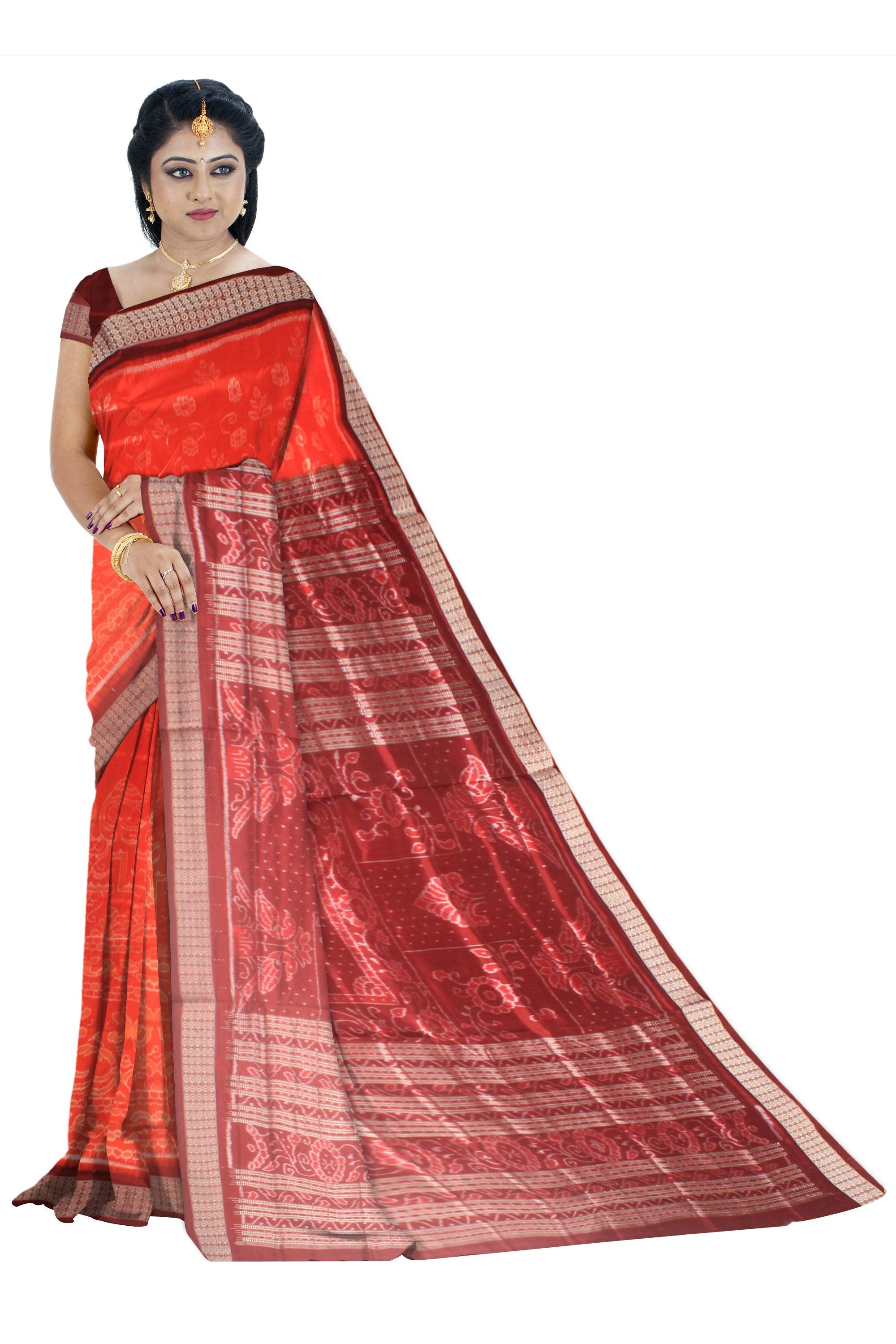 A Sambalpuri pata saree in orange color base in body flower motifs,with blouse piece. - Koshali Arts & Crafts Enterprise