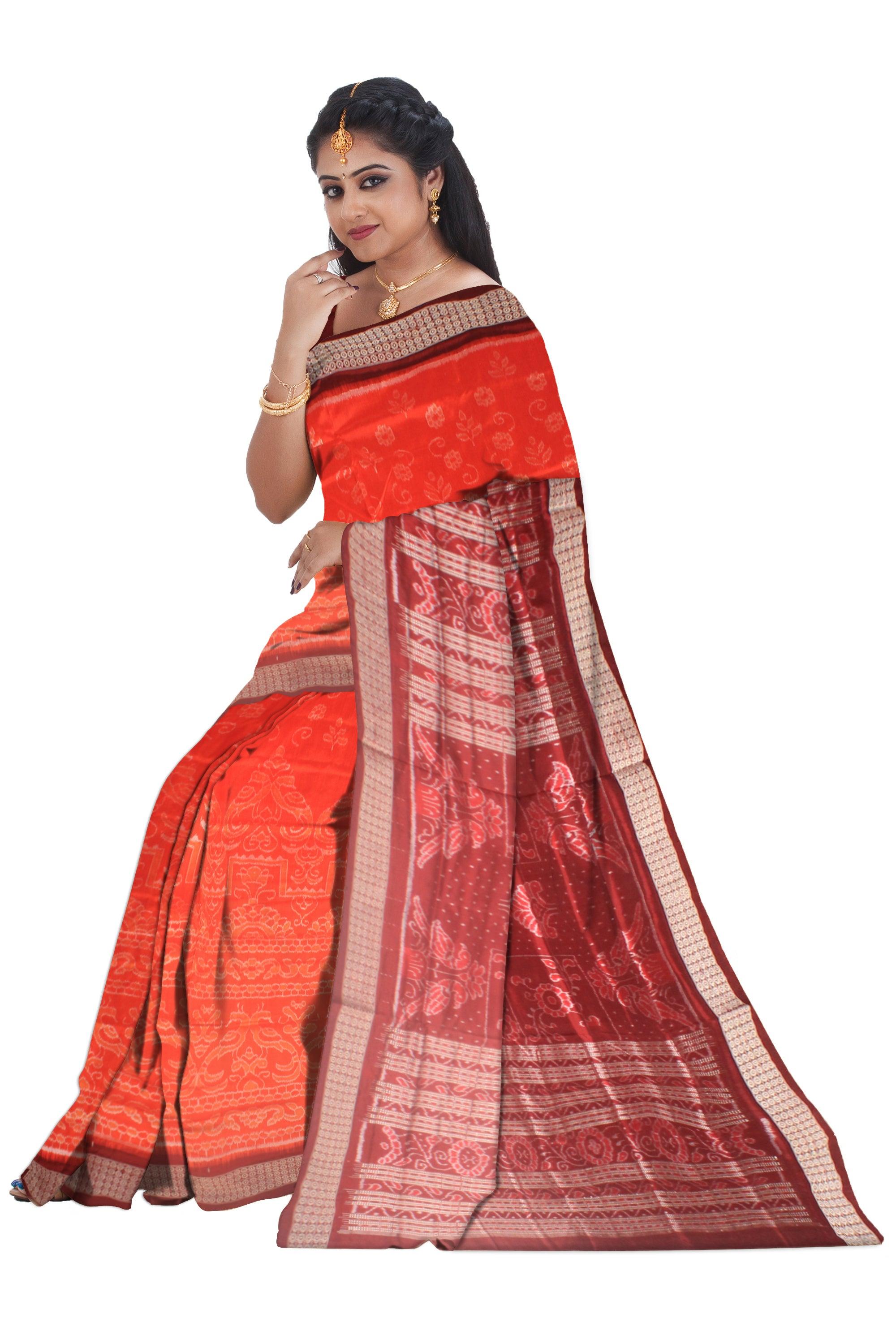A Sambalpuri pata saree in orange color base in body flower motifs,with blouse piece. - Koshali Arts & Crafts Enterprise