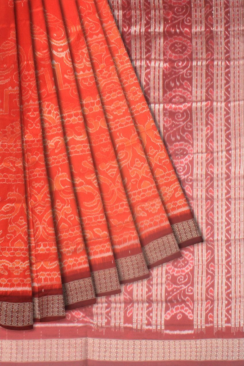 A Sambalpuri pata saree in orange color base in body flower motifs,with blouse piece. - Koshali Arts & Crafts Enterprise