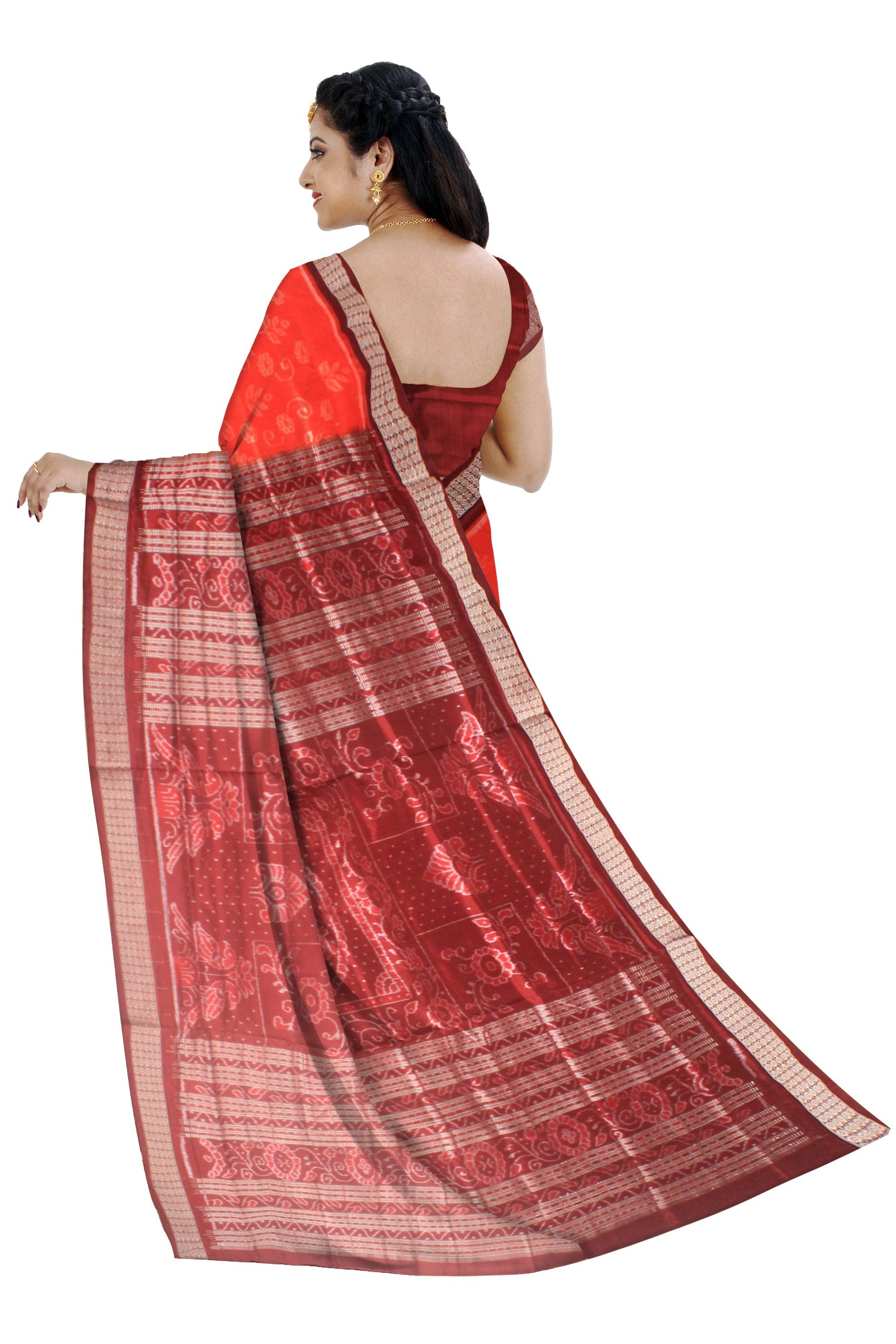 A Sambalpuri pata saree in orange color base in body flower motifs,with blouse piece. - Koshali Arts & Crafts Enterprise