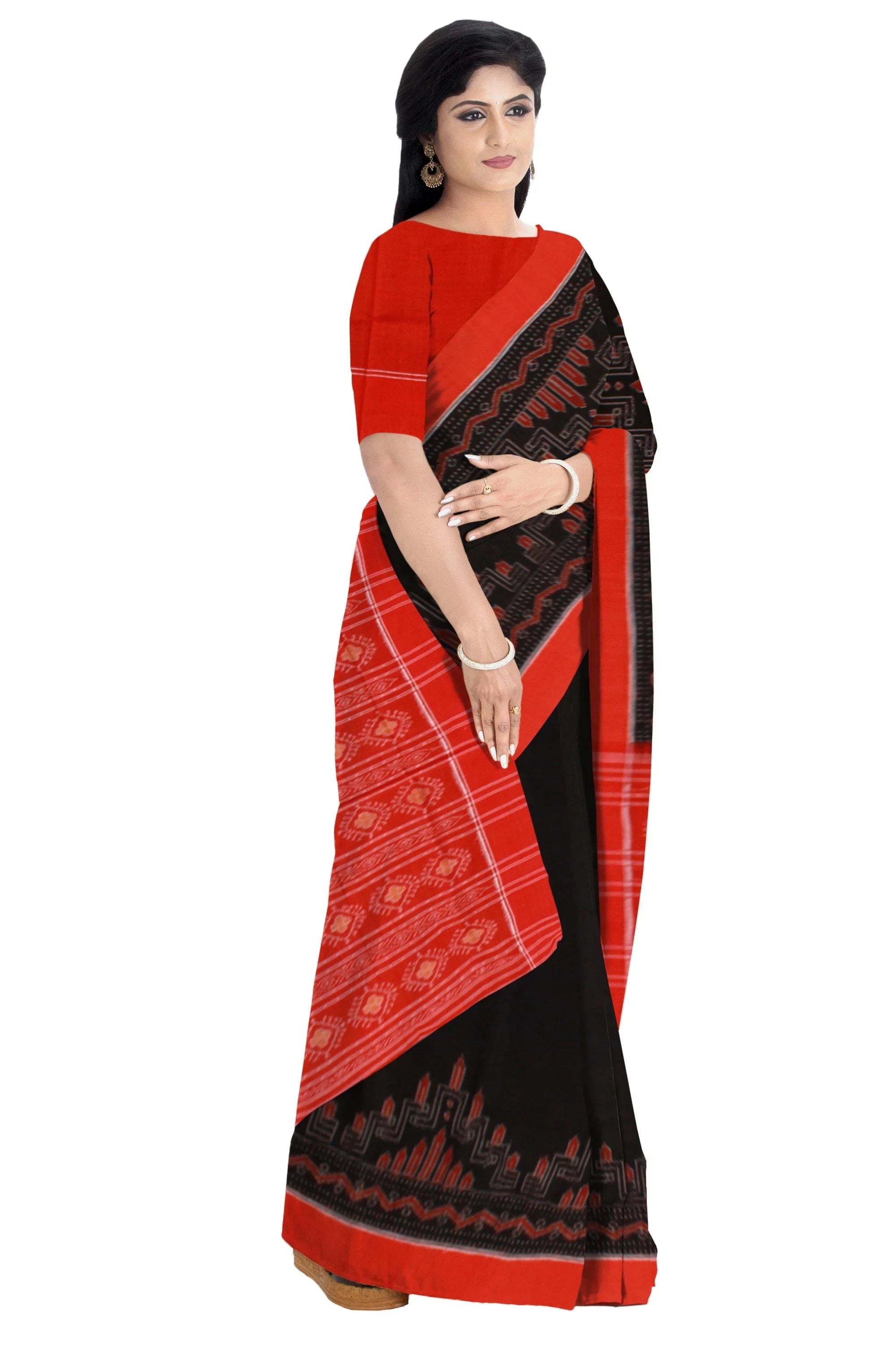 An authentic Sambalpuri Bandha Saree in black color and red pallu with blouse piece - Koshali Arts & Crafts Enterprise