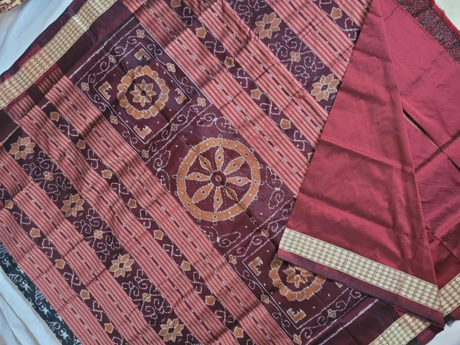 TERRACOTTA PATTERN PATLI PATA SAREE IS BLACK AND MAROON COLOR BASE,COMES WITH MATCHING BLOUSE PIECE. - Koshali Arts & Crafts Enterprise