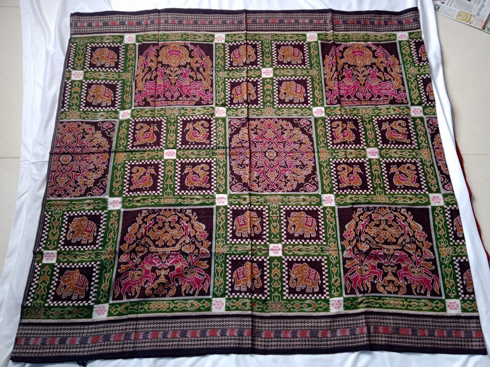 Latest Sambalpuri bandha design cotton saree is green and coffee color. - Koshali Arts & Crafts Enterprise