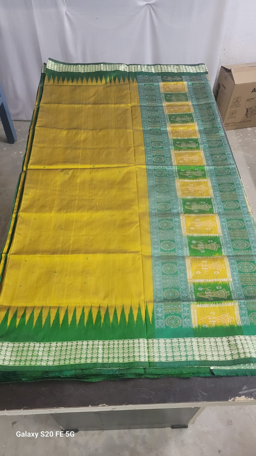 Mustard yellow silk Ikat design saree