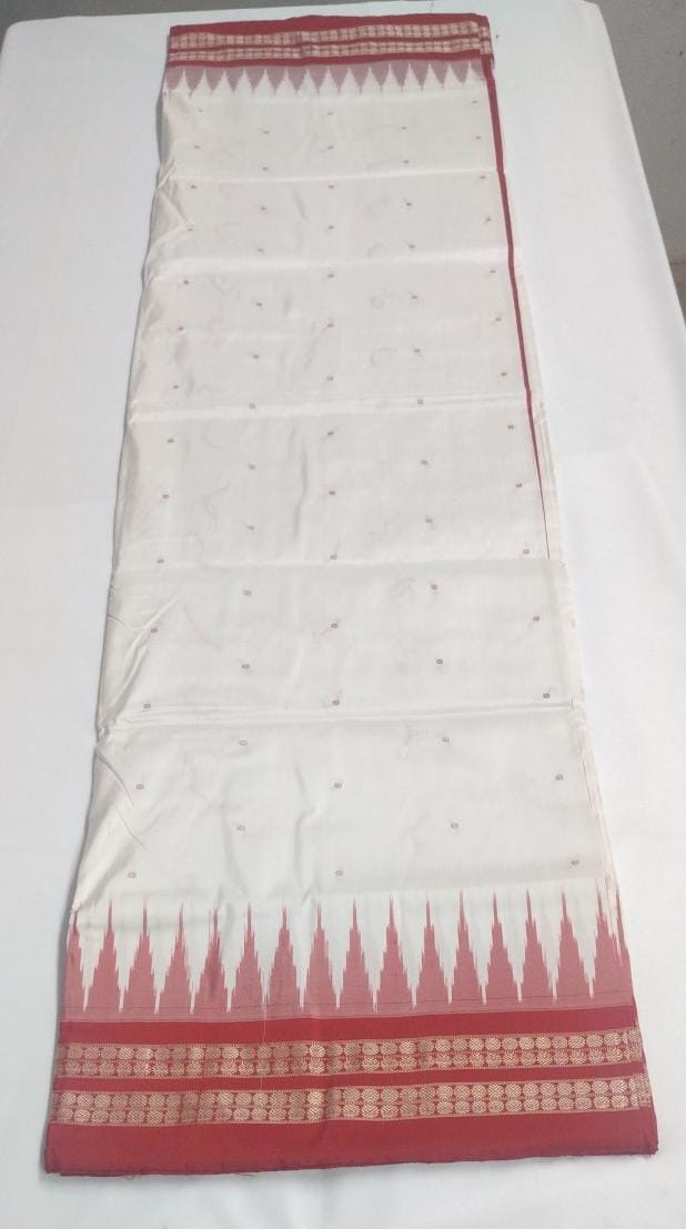 Crisp white body with bold red and gold accents