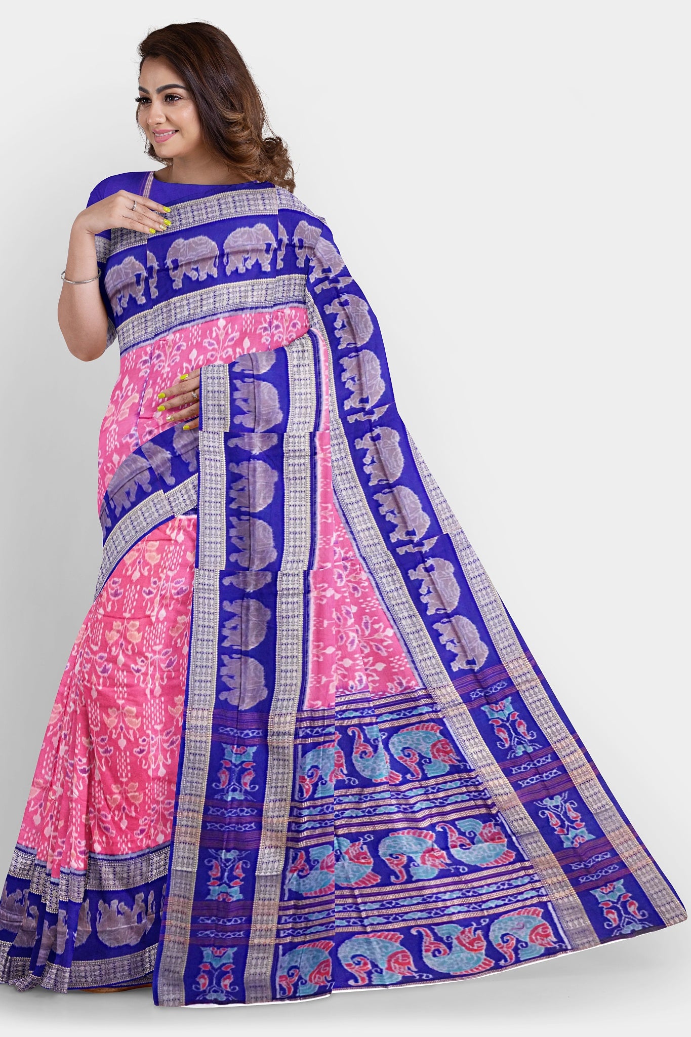 Taffy and blue Sambalpuri saree featuring an elegant elephant and flower body pattern, with a pallu design showcasing intricate fish motifs.