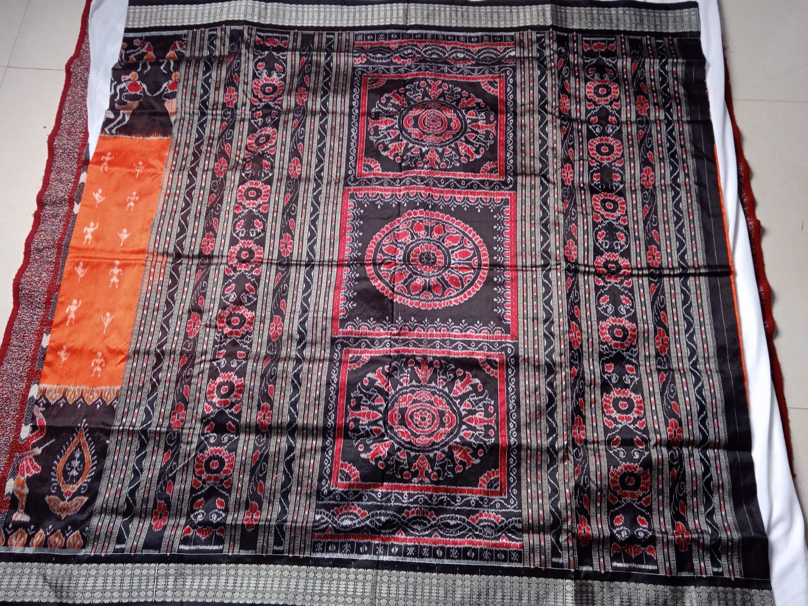 Nartaki with terracotta pattern pure silk saree is Orange & Black color base. - Koshali Arts & Crafts Enterprise