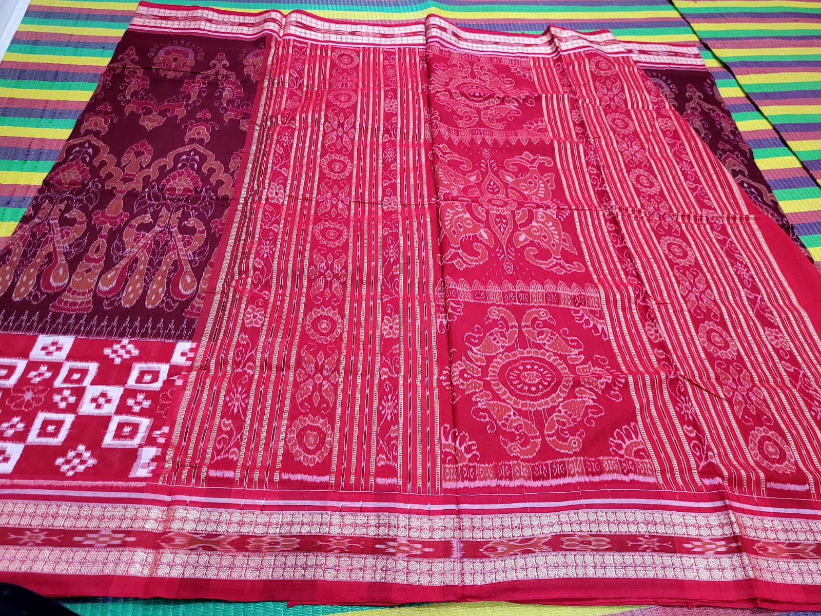 Coffee and Red pure Sambalpuri cotton saree features peacock with pasapali pattern, with a pallu design of peacock with fish. - Koshali Arts & Crafts Enterprise