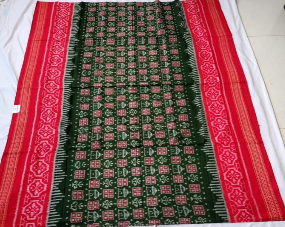 This green and red Sambalpuri saree features a body pattern of little house designs and a pallu adorned with big floral motifs.