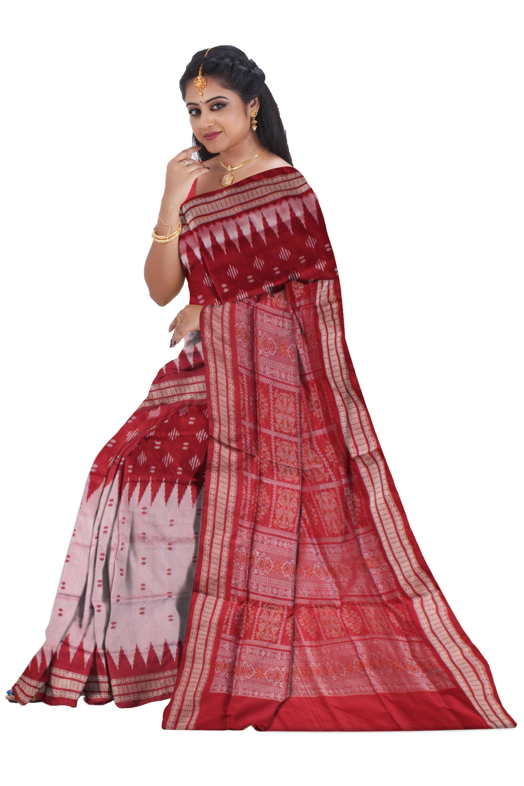 IKAT PATTERN PATA SAREE IS RED AND SILVER COLOR BASE, ATTACHED WITH MATCHING BLOUSE PIECE. - Koshali Arts & Crafts Enterprise