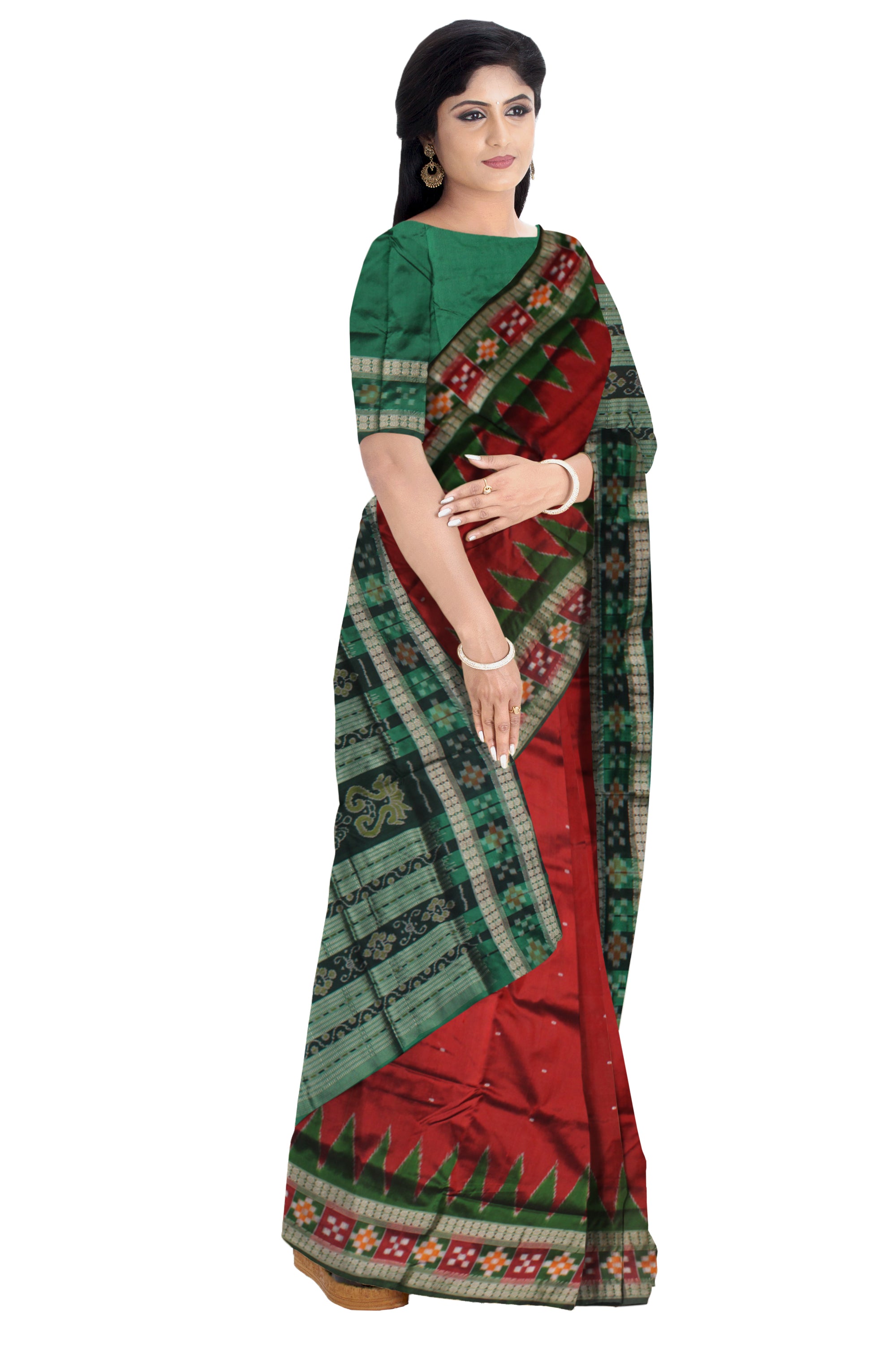 TRADITIONAL DHADI SAPTA PATTERN PATA SAREE IS MAROON AND GREEN COLOR BASE, AVAILABLE WITH MATCHING BLOUSE PIECE. - Koshali Arts & Crafts Enterprise